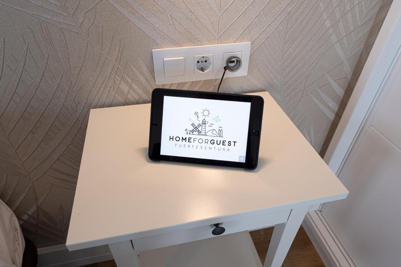 Homeforguest Modern And New Beachfront Apartment La Oliva Bagian luar foto